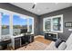 Spacious home office with water views and comfortable seating at 930 Monterey Ne Pt, St Petersburg, FL 33704