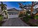 House exterior at night with landscaping at 930 Monterey Ne Pt, St Petersburg, FL 33704