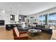 Modern kitchen with island, stainless steel appliances, and open concept living area at 930 Monterey Ne Pt, St Petersburg, FL 33704
