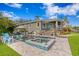Luxury pool and spa with lounge chairs and patio at 930 Monterey Ne Pt, St Petersburg, FL 33704