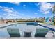 Relaxing pool with in-water loungers and spa at 930 Monterey Ne Pt, St Petersburg, FL 33704