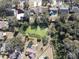 Aerial view of neighborhood with pond and houses at 10215 Evening Trail Dr, Riverview, FL 33569