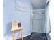 Bathroom with a walk-in shower and updated fixtures at 10215 Evening Trail Dr, Riverview, FL 33569