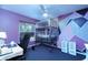 bedroom with crib and geometric wall art at 10215 Evening Trail Dr, Riverview, FL 33569