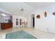 Bright dining area with tile floors and access to the kitchen at 10215 Evening Trail Dr, Riverview, FL 33569