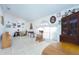Living room with tiled floors and a mix of antique furniture at 10215 Evening Trail Dr, Riverview, FL 33569