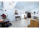 Bright living room with hardwood floors, rocking chair, and antique furniture at 10215 Evening Trail Dr, Riverview, FL 33569