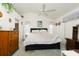 Main bedroom with a king-size bed and ample closet space at 10215 Evening Trail Dr, Riverview, FL 33569