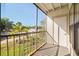 Screened balcony overlooking lush green landscaping at 11901 4Th N St # 9105, St Petersburg, FL 33716