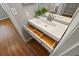White vanity with sink and drawers in the bathroom at 11901 4Th N St # 9105, St Petersburg, FL 33716