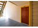 Condo building entry with red door and yellow trim at 11901 4Th N St # 9105, St Petersburg, FL 33716