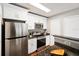 Modern kitchen with white cabinets, granite countertops and stainless steel appliances at 11901 4Th N St # 9105, St Petersburg, FL 33716