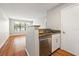 Modern kitchen with white cabinets, granite countertops, and stainless steel appliances at 11901 4Th N St # 9105, St Petersburg, FL 33716