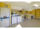 Community laundry room with several washers and dryers at 11901 4Th N St # 9105, St Petersburg, FL 33716