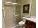 Bathroom with walk-in shower and grab bars at 1213 Huntington Greens Dr, Sun City Center, FL 33573