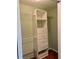 Spacious walk-in closet with built-in shelving and drawers at 1213 Huntington Greens Dr, Sun City Center, FL 33573