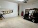 Spacious garage with golf cart and storage at 1213 Huntington Greens Dr, Sun City Center, FL 33573