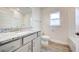 Clean bathroom with granite countertop and tub at 13278 Ogden Glade Rd, Dade City, FL 33525