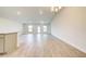 Spacious living room with tile flooring and vaulted ceilings at 13278 Ogden Glade Rd, Dade City, FL 33525