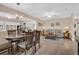 Open concept dining area with a wooden table and chairs at 1613 Heather Pl, Palm Harbor, FL 34684