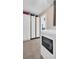 Laundry room with washer, dryer, cabinets, and extra storage at 1613 Heather Pl, Palm Harbor, FL 34684