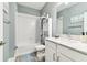 Modern bathroom with white subway tiles and quartz vanity at 18015 Fenders Way, Land O Lakes, FL 34638