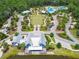 Aerial view of the community, highlighting amenities and lakefront location at 18015 Fenders Way, Land O Lakes, FL 34638