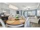 Elegant dining room featuring a round table and chandelier at 18015 Fenders Way, Land O Lakes, FL 34638