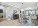 Spacious dining room with hardwood floors and stylish decor at 18015 Fenders Way, Land O Lakes, FL 34638