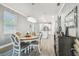 Open concept dining room, kitchen and living room at 18015 Fenders Way, Land O Lakes, FL 34638