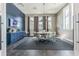 Modern meeting room with a large table and comfortable chairs at 18015 Fenders Way, Land O Lakes, FL 34638
