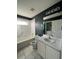 Clean bathroom with tub, toilet, and vanity at 18116 Portside St, Tampa, FL 33647