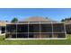 Home features a large screened porch at 18116 Portside St, Tampa, FL 33647