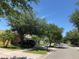 Residential street with mature trees and homes at 18116 Portside St, Tampa, FL 33647