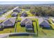 Aerial view of homes showcasing backyard and screened lanais at 18241 Romanesque Ct, Spring Hill, FL 34610