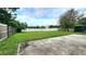 Spacious backyard with a large patio and fenced area at 19130 Wood Sage Dr, Tampa, FL 33647