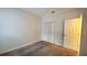 Simple bedroom with carpet and double door closet at 19130 Wood Sage Dr, Tampa, FL 33647
