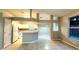 Kitchen with white cabinets and an island at 19130 Wood Sage Dr, Tampa, FL 33647