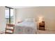 Bedroom with water view and wooden furniture at 2413 Bayshore Blvd # 404, Tampa, FL 33629