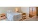 Cozy bedroom with wood furniture and a comfortable bed at 2413 Bayshore Blvd # 404, Tampa, FL 33629