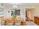 Dining area with a wooden table and pass-through to kitchen at 2413 Bayshore Blvd # 404, Tampa, FL 33629