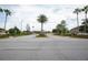 Key Vista community entrance with gated access and landscaping at 2749 Plantain Dr, Holiday, FL 34691