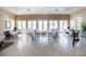 Community room with tables and chairs for events at 2749 Plantain Dr, Holiday, FL 34691
