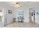 Charming dining room with hardwood floors and access to kitchen at 2749 Plantain Dr, Holiday, FL 34691