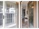 Front entry with door and sidelight, and view into the foyer at 2749 Plantain Dr, Holiday, FL 34691