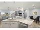 Modern kitchen with large island, stainless steel appliances, and ample counter space at 2749 Plantain Dr, Holiday, FL 34691