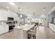 Modern kitchen with large island, stainless steel appliances, and ample counter space at 2749 Plantain Dr, Holiday, FL 34691