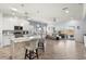 Modern kitchen with large island, stainless steel appliances, and ample counter space at 2749 Plantain Dr, Holiday, FL 34691