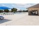 Community pool and lounge area with picnic tables at 2749 Plantain Dr, Holiday, FL 34691