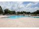 Enjoy this community pool with plenty of seating at 2749 Plantain Dr, Holiday, FL 34691